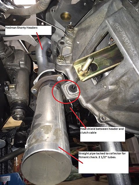 Drivers side collector at clutch cable.jpg