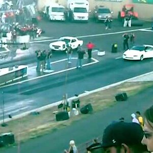 Camaro vs Mustang Drag Race At Bandimere Speedway.mp4