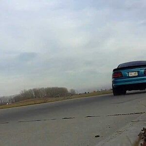 94 Mustang GT 5.0 five speed accelerating away from camera