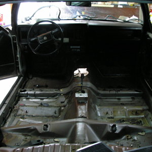 Interior stripped out of the car.
