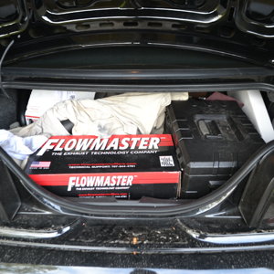 A trunk full of new exhaust parts