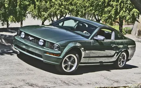 112_0508_Bullitt_12z+2005_Mustang_GT+Front_Drivers_Side_View.webp