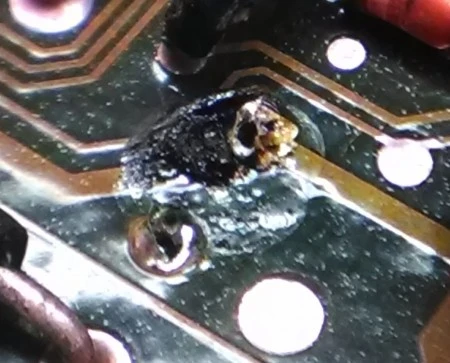 bad-old-capacitor-2-on-board-goop-2-450x363.webp