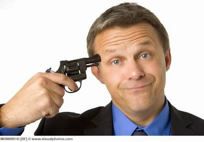 Businessman_Holding_Gun_To_Head_MON098143.webp