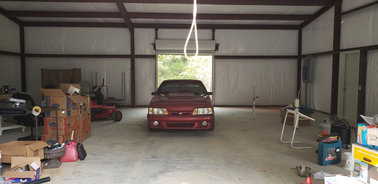 Car in shop.webp