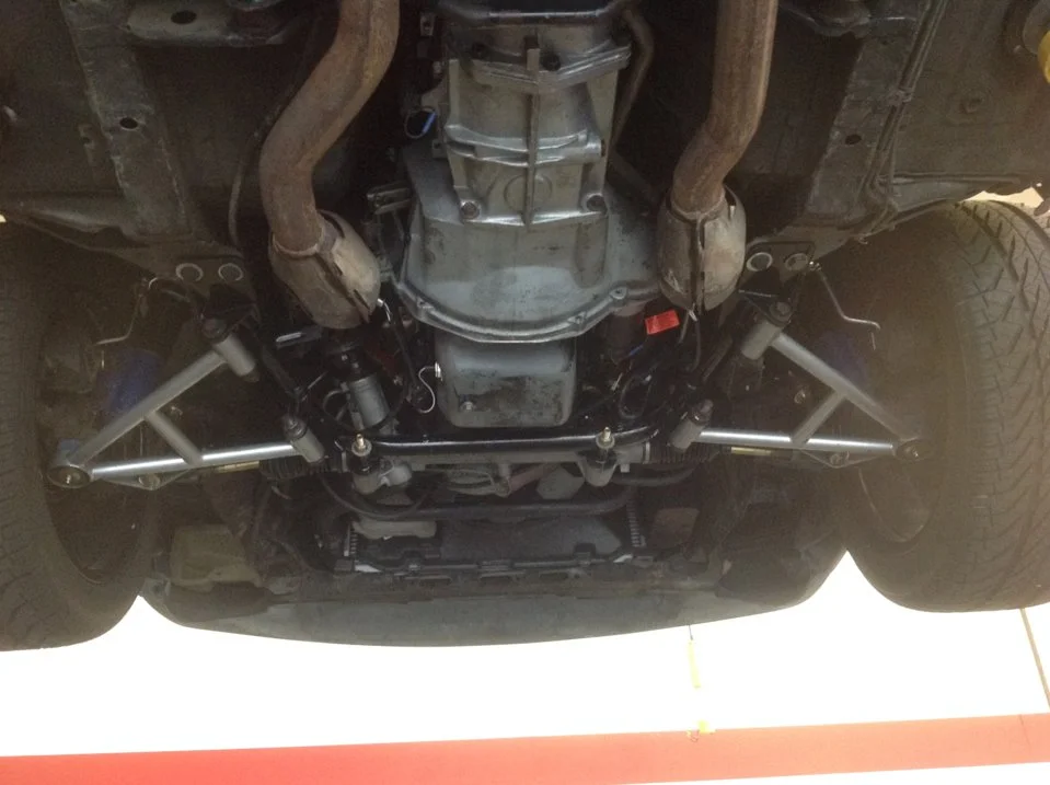 Chrome Moly Arms Under Car.webp