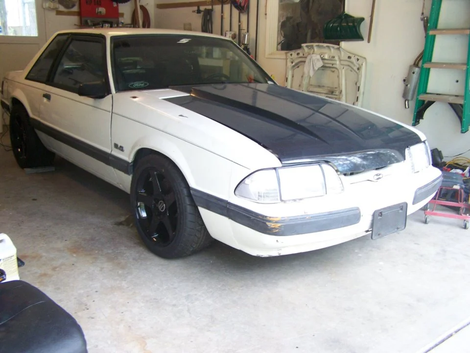 coupe with cowl hood.webp