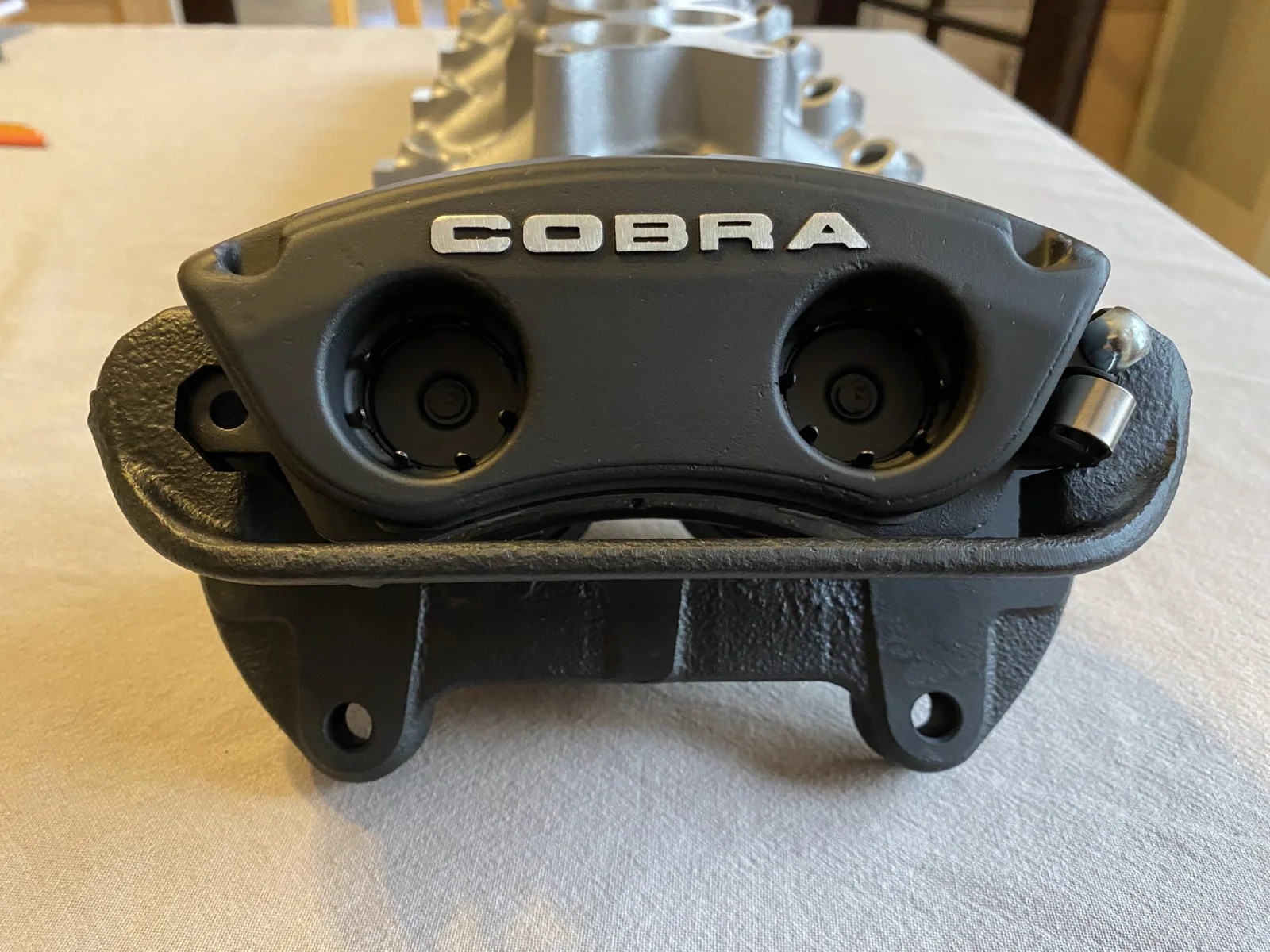 Front Cobra Calipers.webp