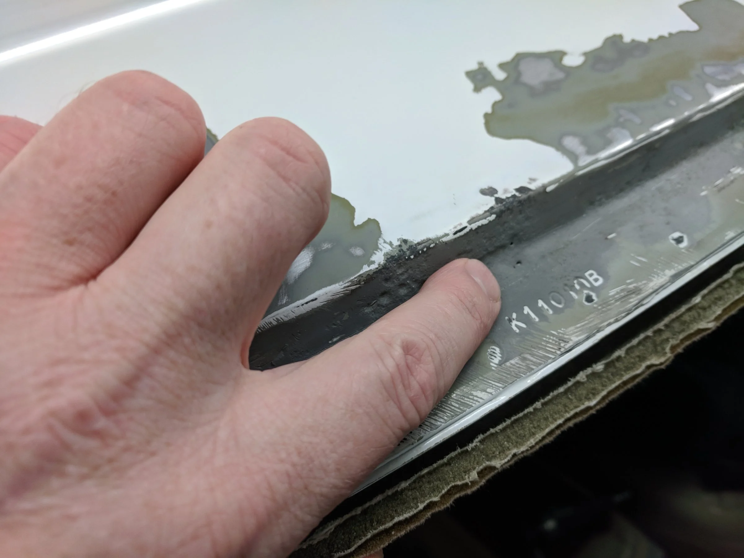 HolesinWindshieldFrame.webp