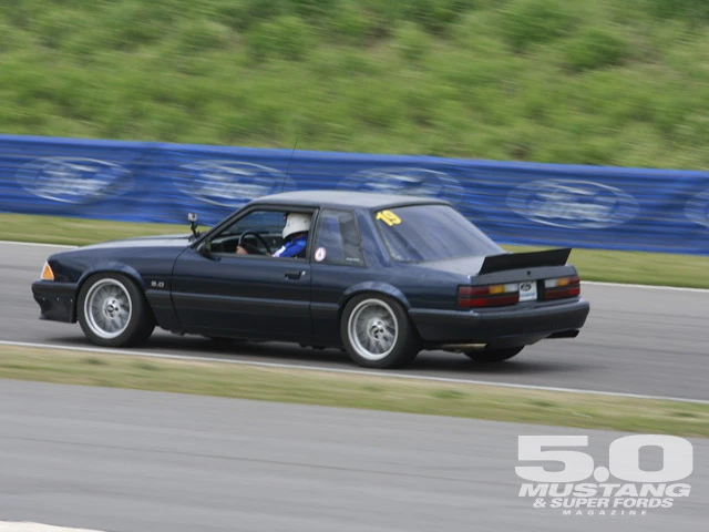 m5lp_0909_208_z+mustang_anniversary_celebration+dark_blue_fox_body.webp