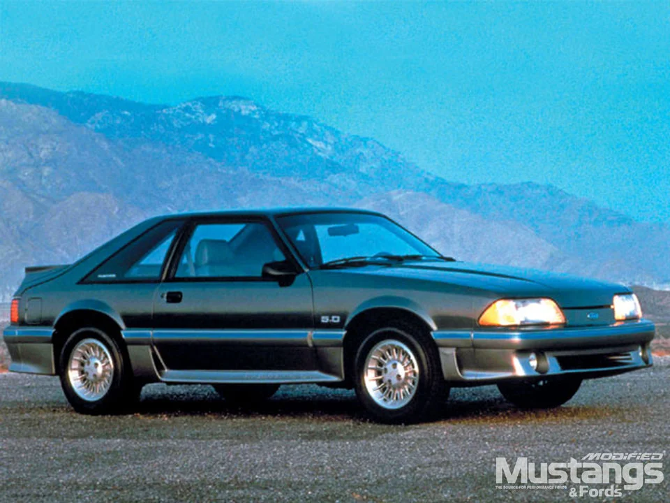 mdmp_0710_09_z%2B1987_ford_mustang_gt%2Bside_angle.webp