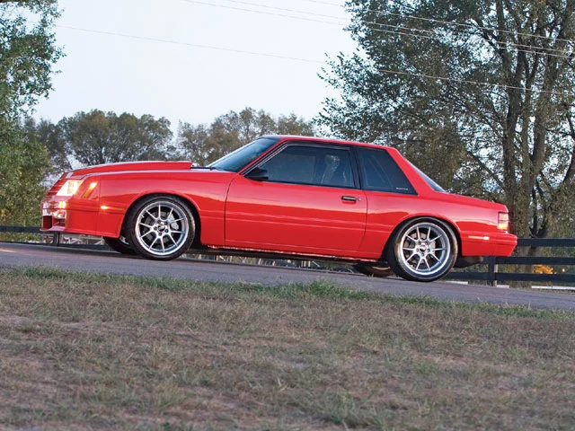 mmfp_0811_12_z+1988_ford_mustang_coupri+left_side.webp