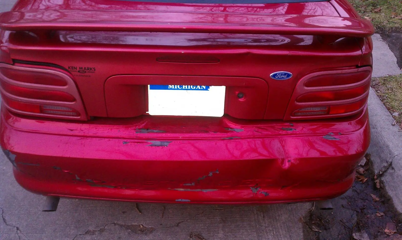 MustangRearDamageErasedplate.webp