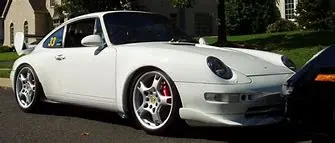 Porsche with lobster wheels.webp