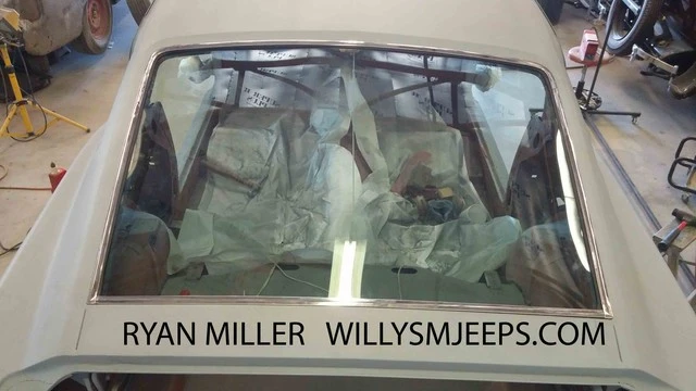 Ryan_Miller_Back_Glass.sized.webp