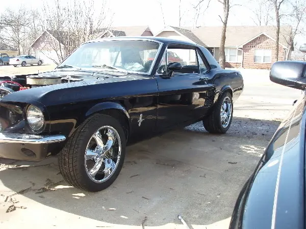 sideofcarwithnewwheels.webp