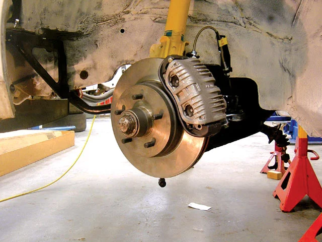 sucp_0710_01_z+1990_chevy_camaro+spindle_and_brake_install.webp