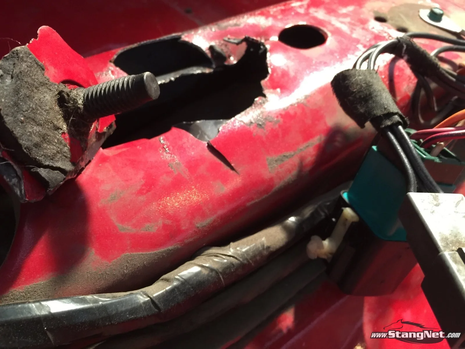 Broken sheet metal on drivers seat mount
